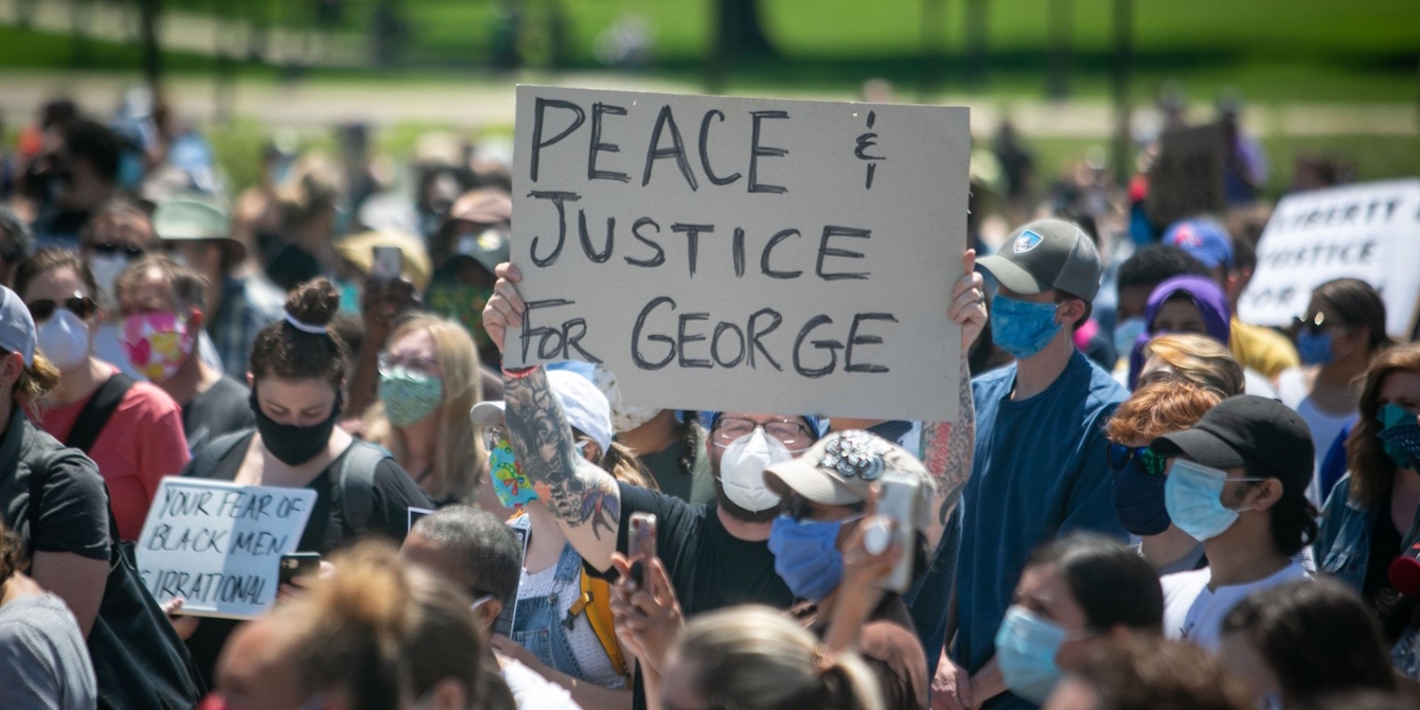 Peace and Justice for George sign at protest